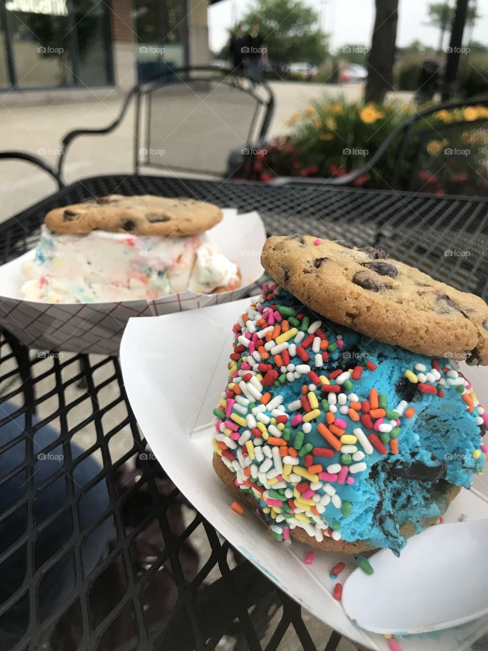 Enjoying a delicious dessert outside of a small shop. Tasty and so very colorful!