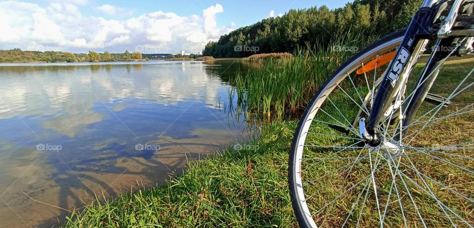 bike on a lake shore and shadows beautiful outside