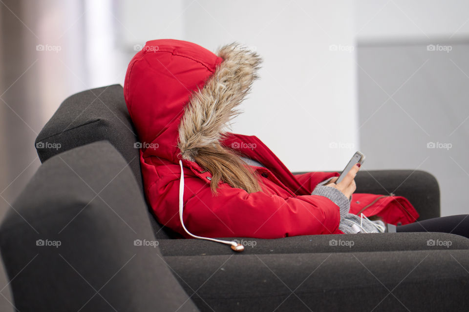 Close-up of women using mobile phone