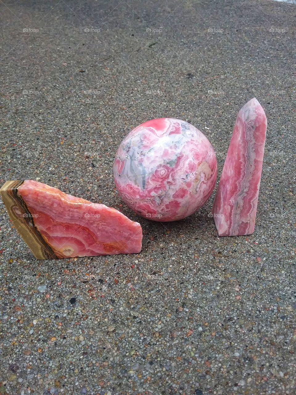 Rhodochrosite
Left to Right:
Rhodochrosite Stalactite Slice, Rhodochrosite Crystal Sphere, Rhodochrosite Tower.
The pink is just so beautiful!