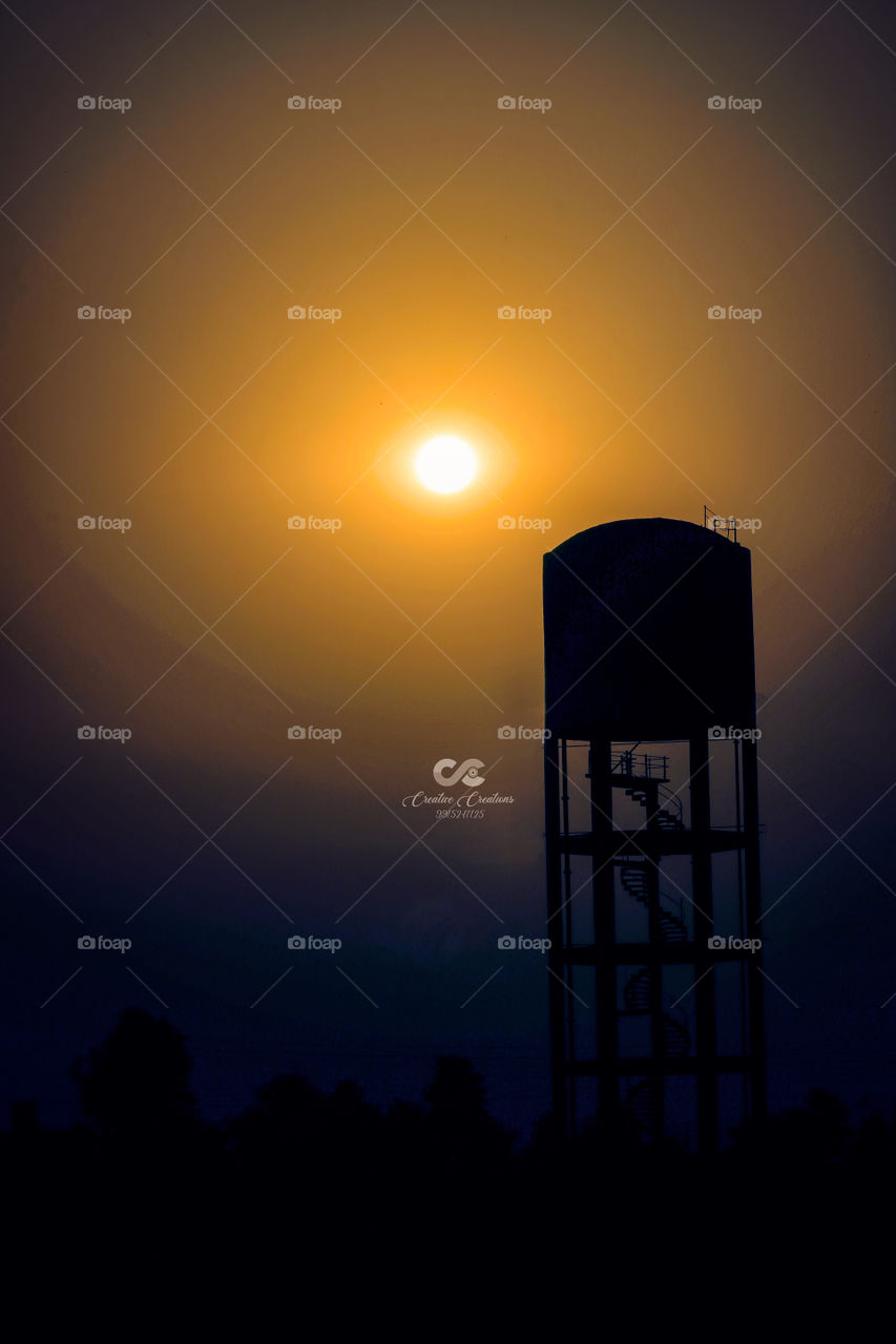 water tank sunset