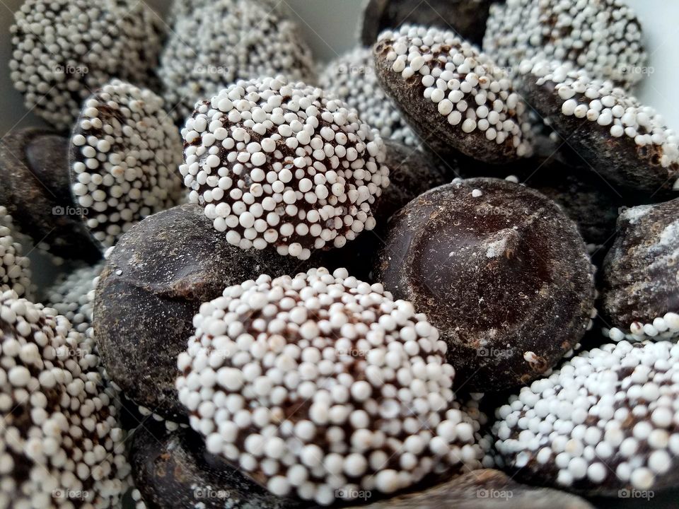 close-up of non-pareil chocolate candies