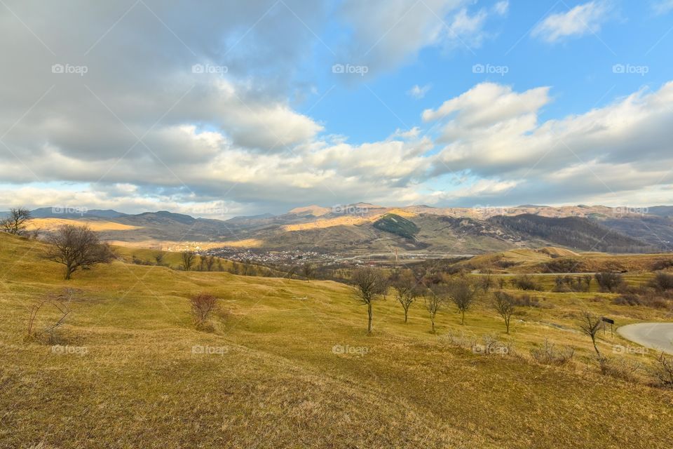 Scenic view of clouds and mountain