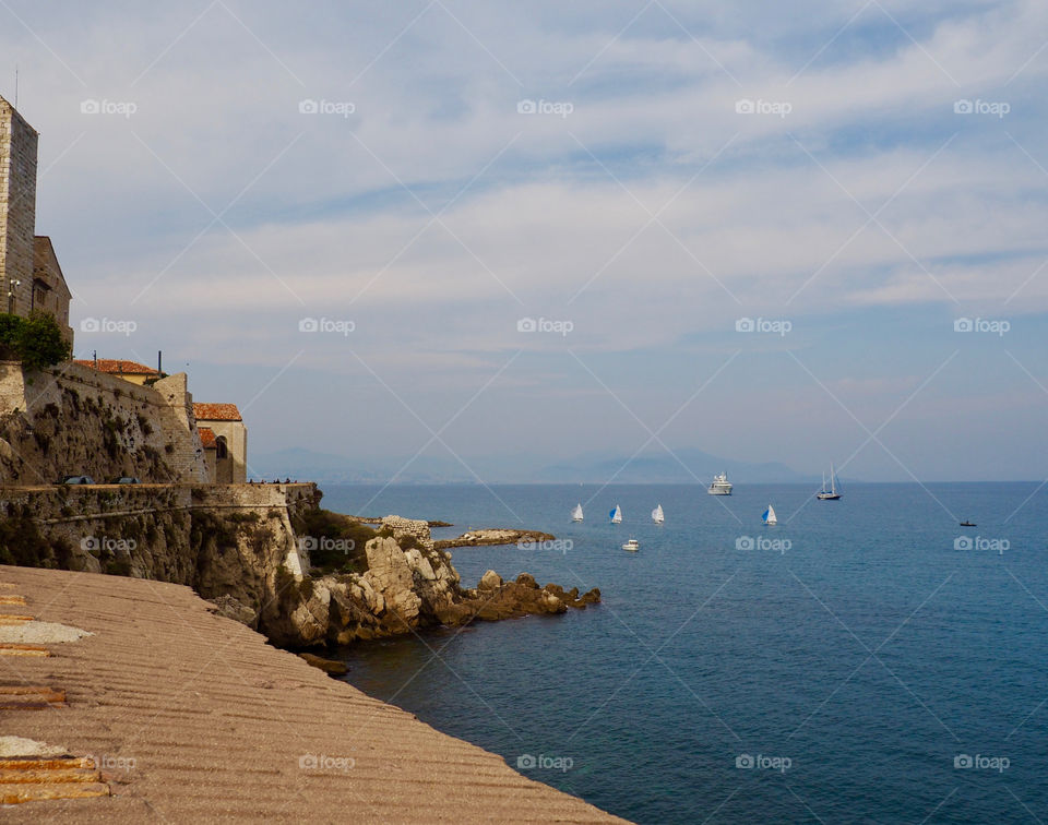 Coastal view of the sea from the old ramparts of Antibes in the south of France.