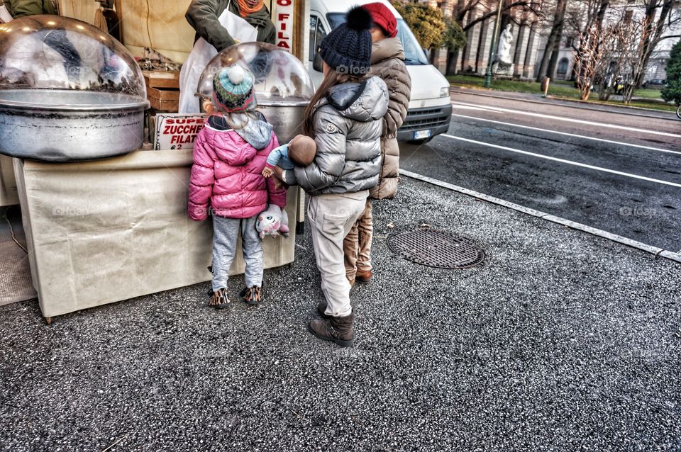 Holiday Market. Children Enjoying the Holiday Carnival