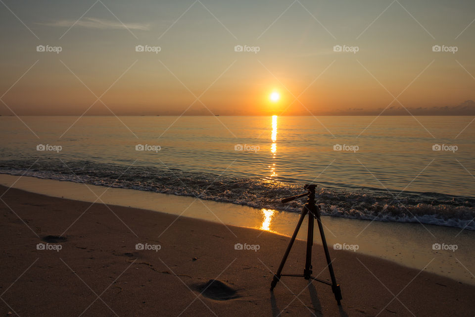 tripod in the Beach at sunrise