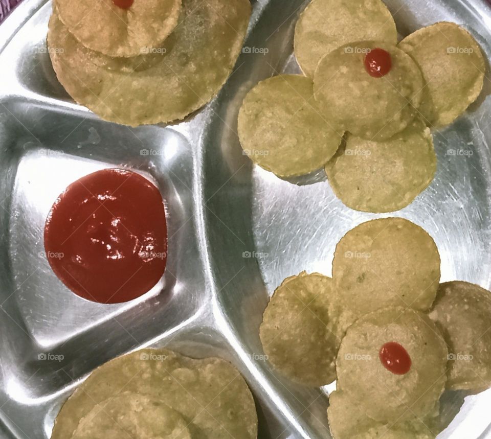 This yummy and tasty food is in ready to eat. Masala Puri and tomato sauce, you can eat anytime when you hungry.
