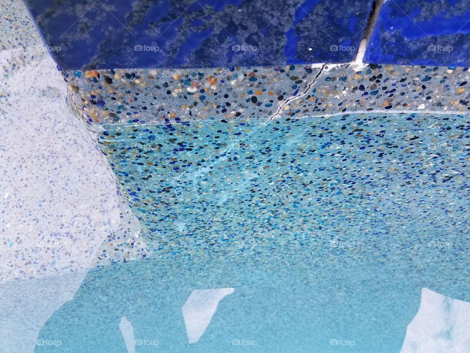 crack in plaster of a swimming pool