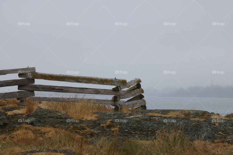 Wooden fence at sea