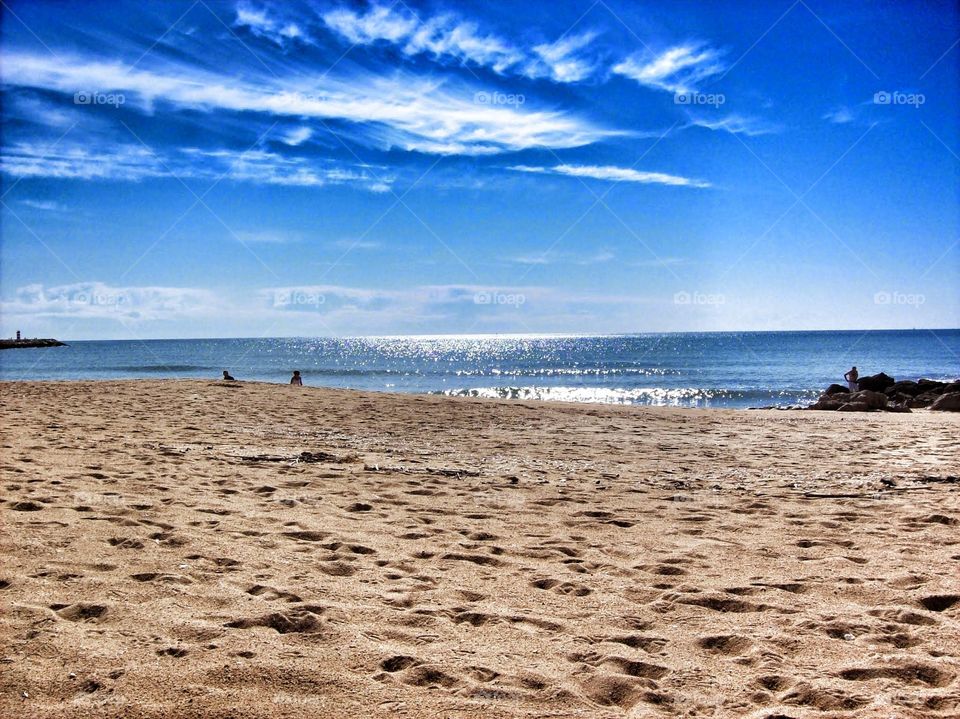 the beach. blue sky and golden beach