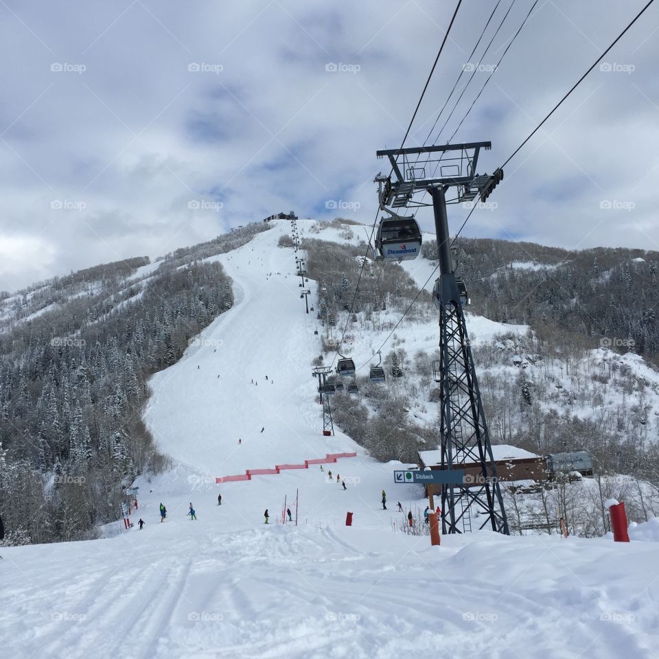 Going up the ski lift. 