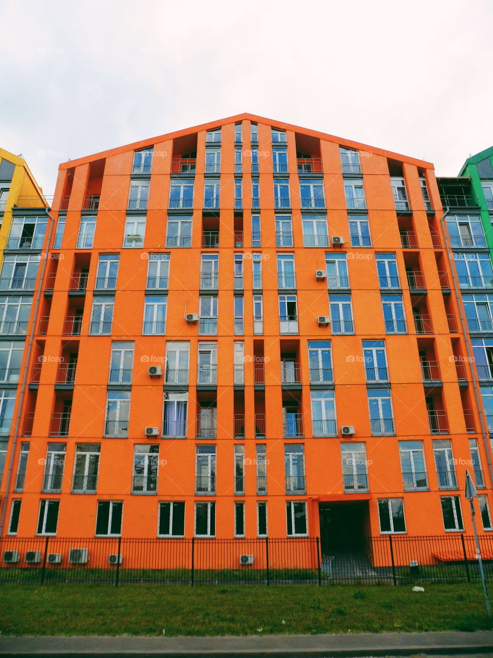 Orange facade of the building