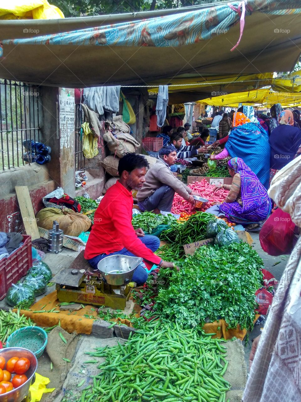 Man selling vegetables in the market