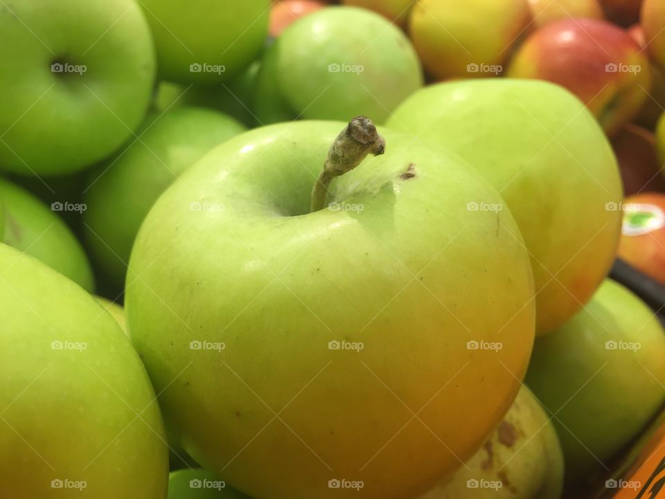 Granny smith apples at market stall