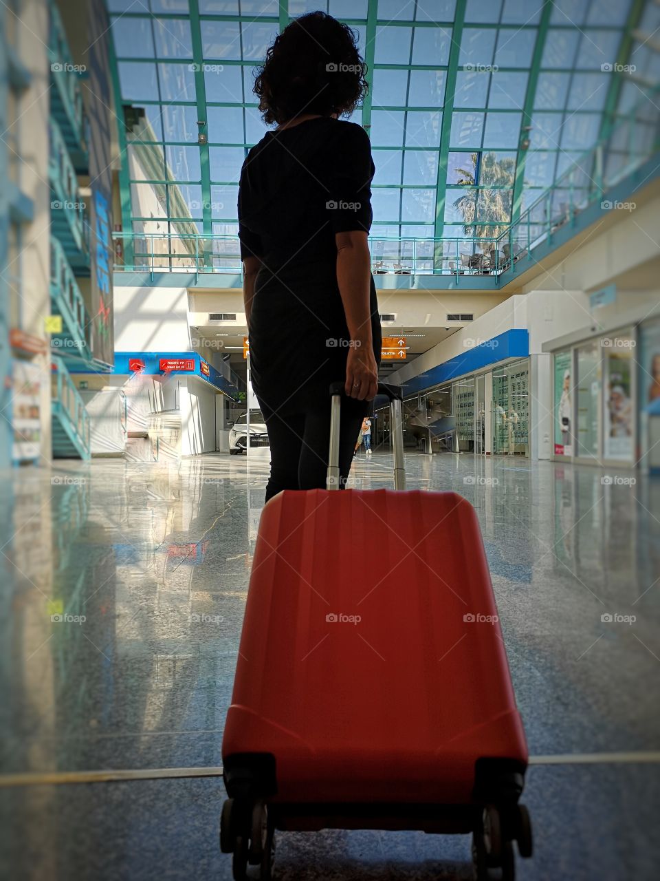 Passenger at the airport with trolley