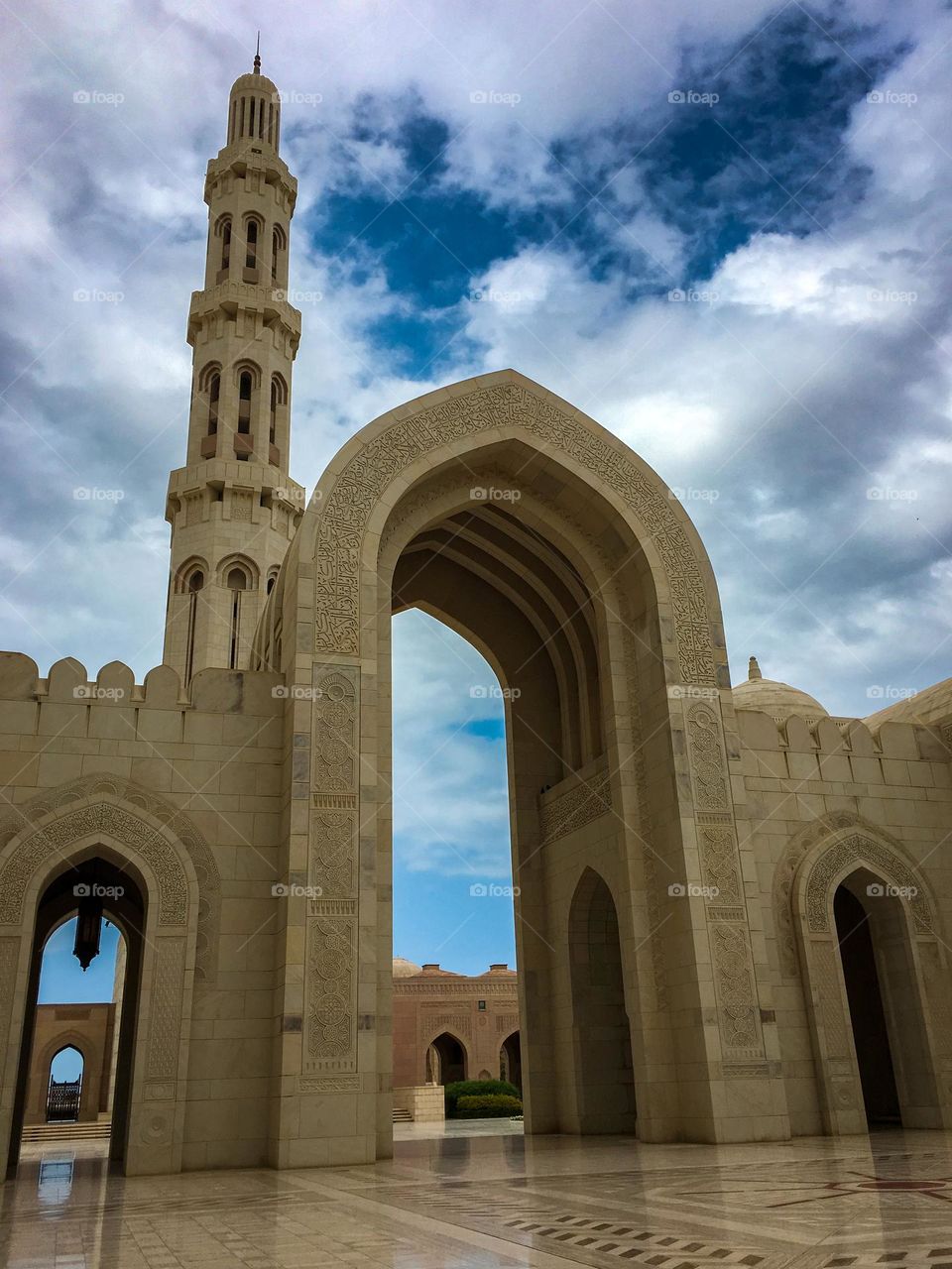 Arches and a minaret. Islamic architecture at a mosque 