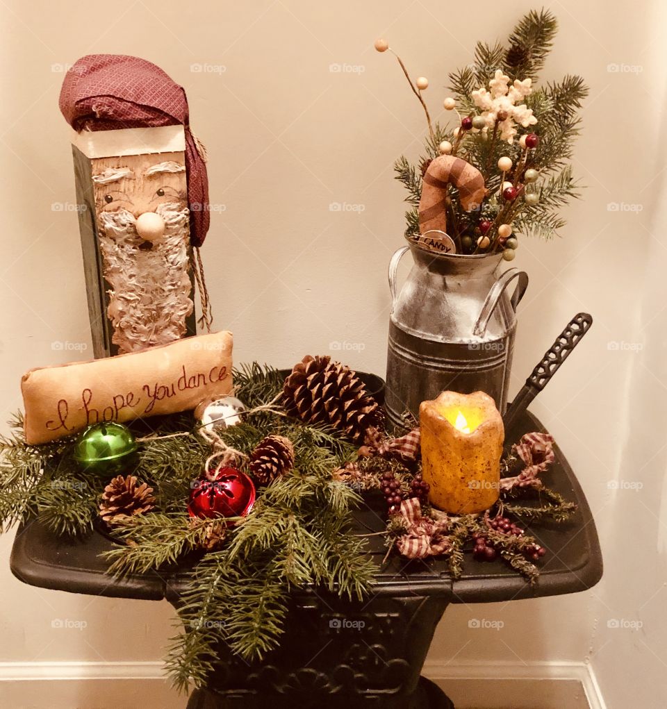 Old pot belly cast iron stove decorated for Christmas 