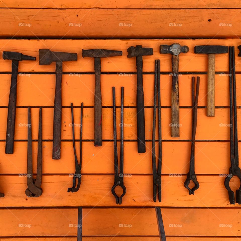 Blacksmithing tools. Hammers and tongs. 
