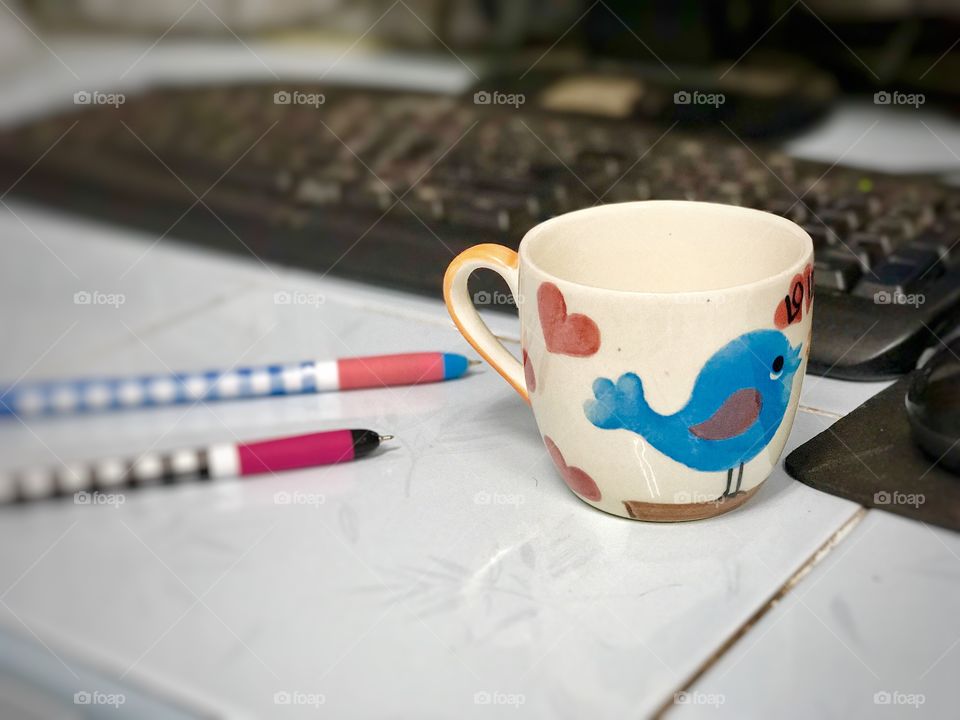 Cup of coffee on the desk