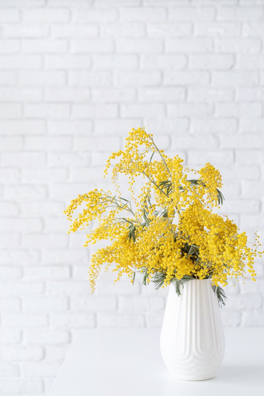 beautiful yellow flowers in the vase