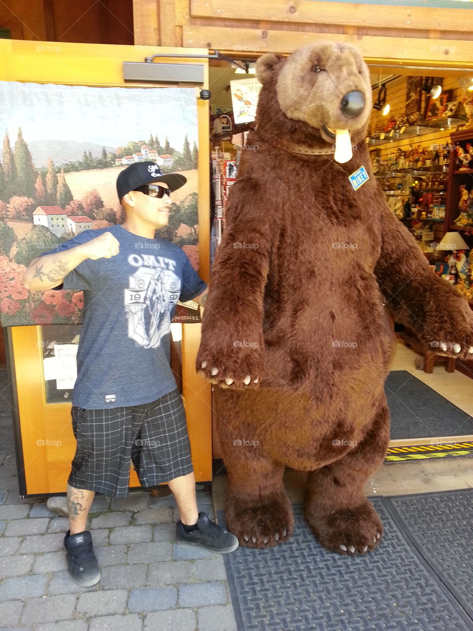 Fighting a bear. me playing around in South Lake Tahoe with a stuffed bear