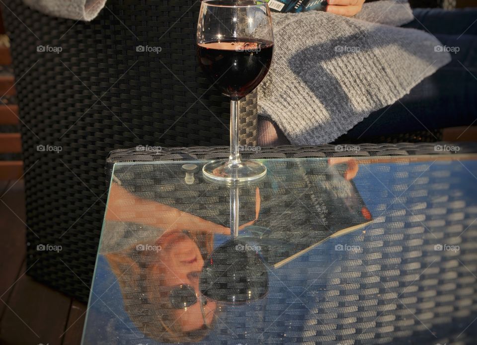 Relax with a book and a glass of wine