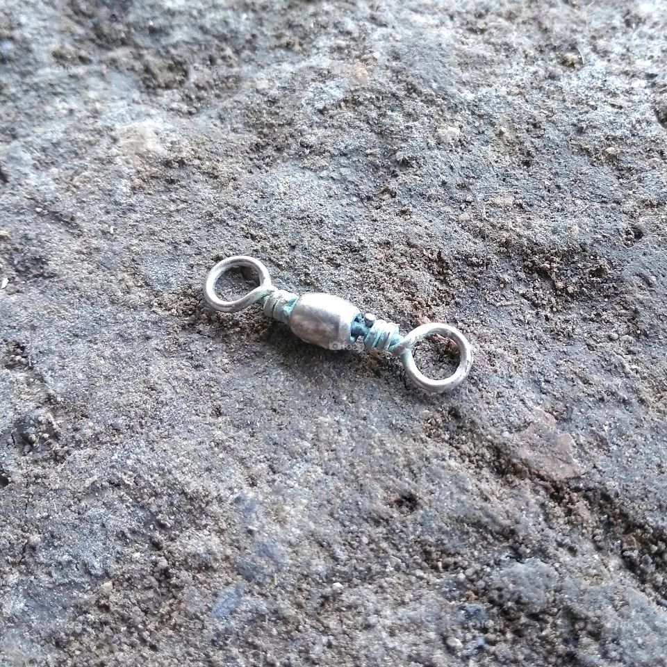 Fishing line connector on the ground