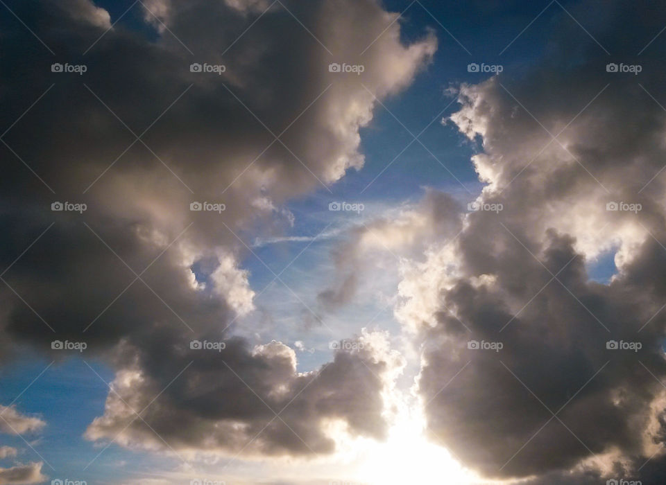 Storm cloud and blue sky