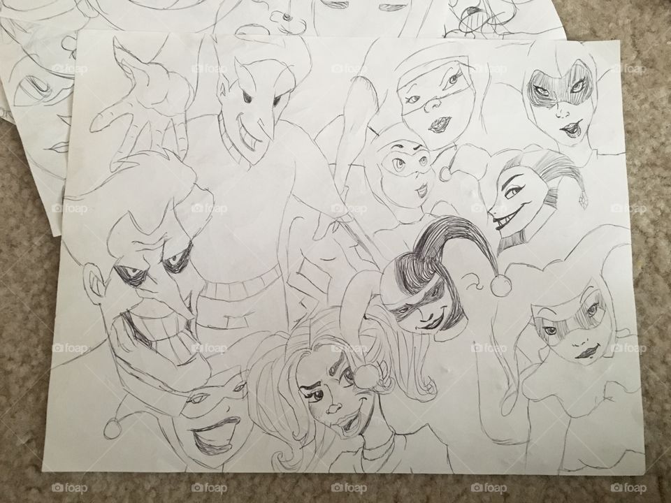 A sketch collage of Joker and Harley from Batman.
