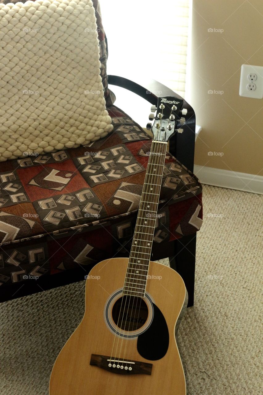 Guitar Against Chair. Guitar Against Chair