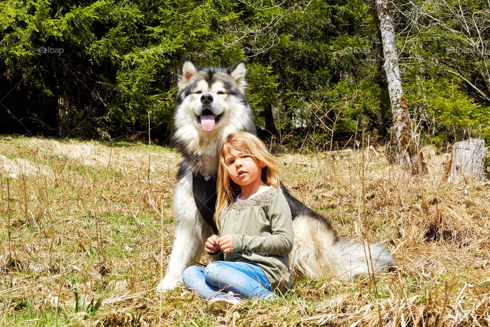child with dog