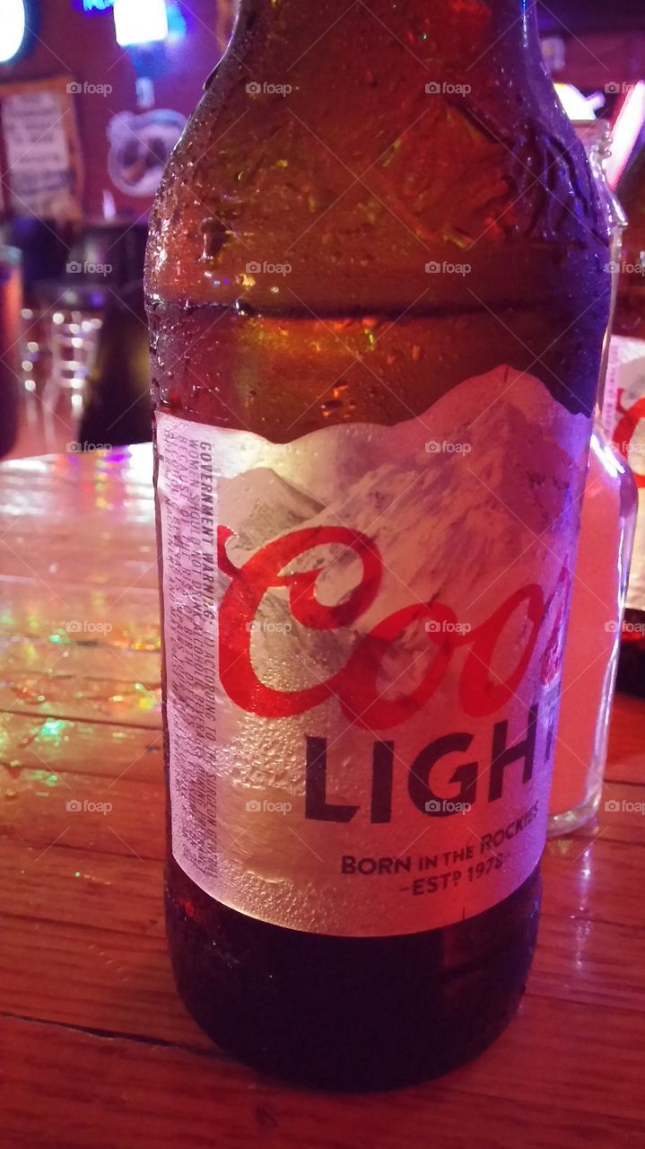 coors. bar night, with good friends