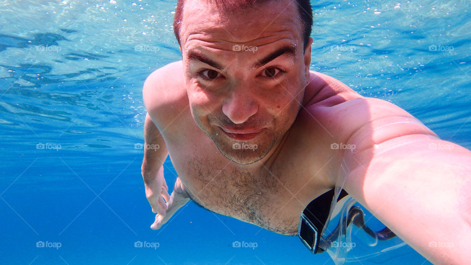 Man swimming in underwater