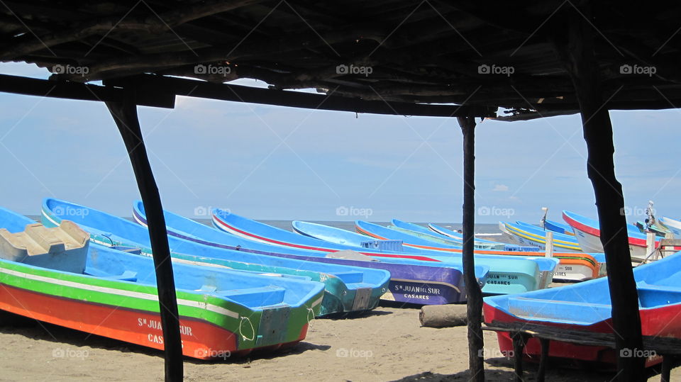 Remote beach in Nicaragua where fishermen use colorful pangas to make a living.