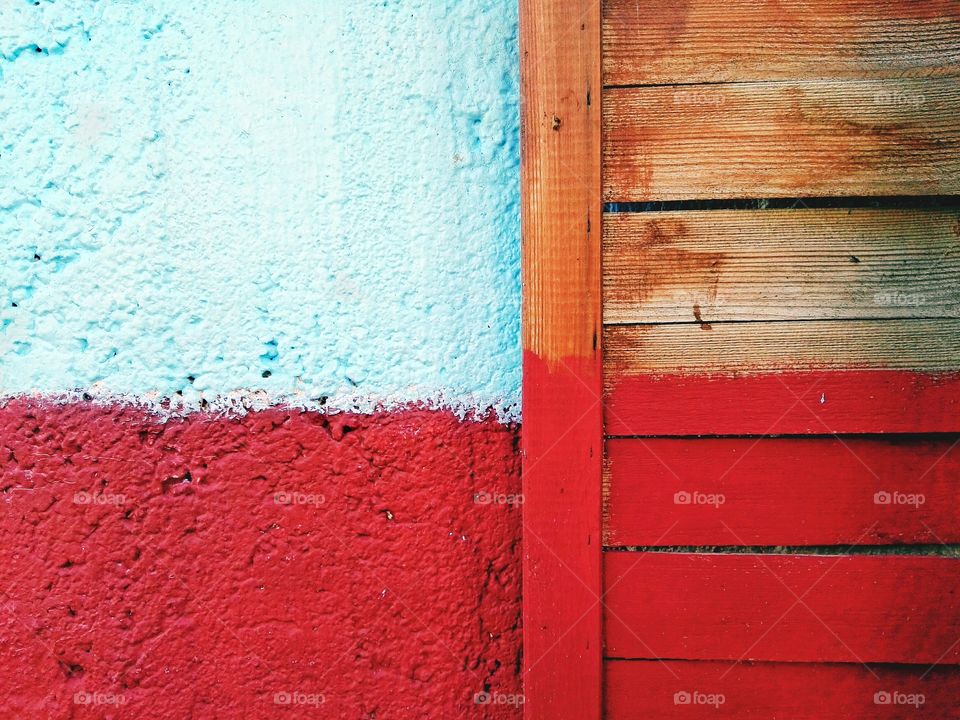 Facade and boards painted red and blue