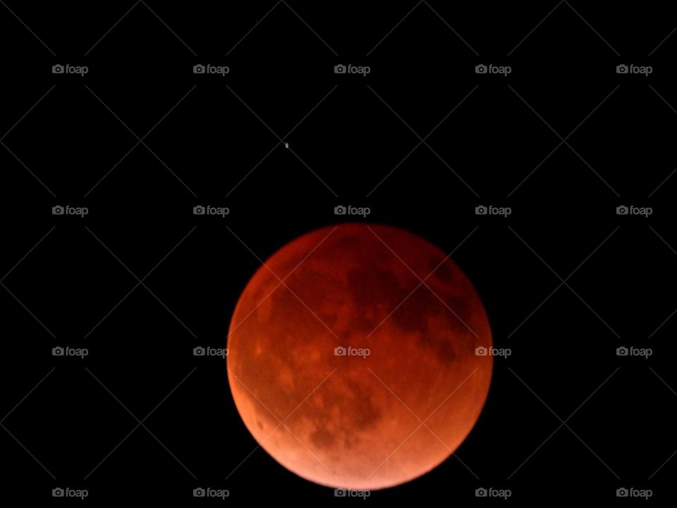 My photos of the Blood Moon, Total lunar eclipse on 15 May 2022 - Lunar eclipses occur when Earth aligns between the sun and the moon and casts a shadow across the lunar surface. The weather condition were very cloudy