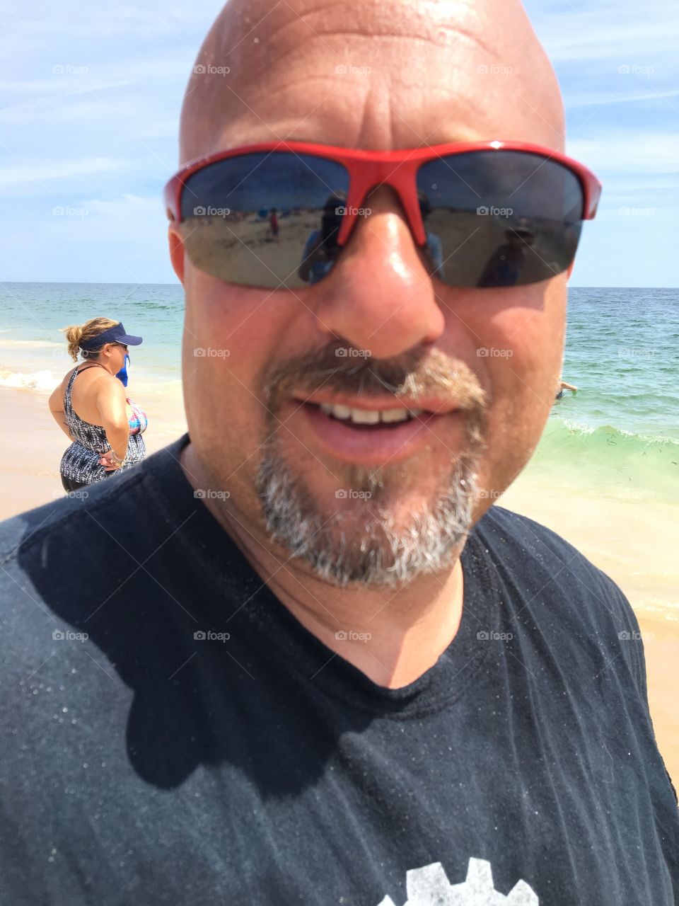 Man with sunglasses at the beach
