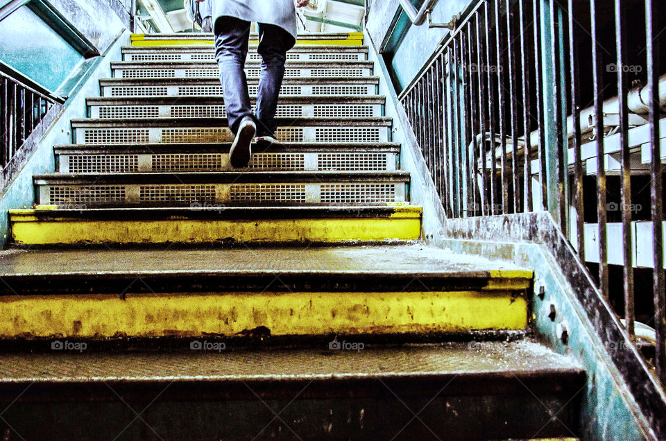 Person climbing stairs