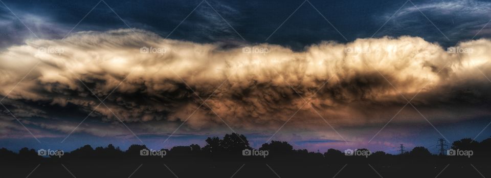 storm clouds rolling over the town