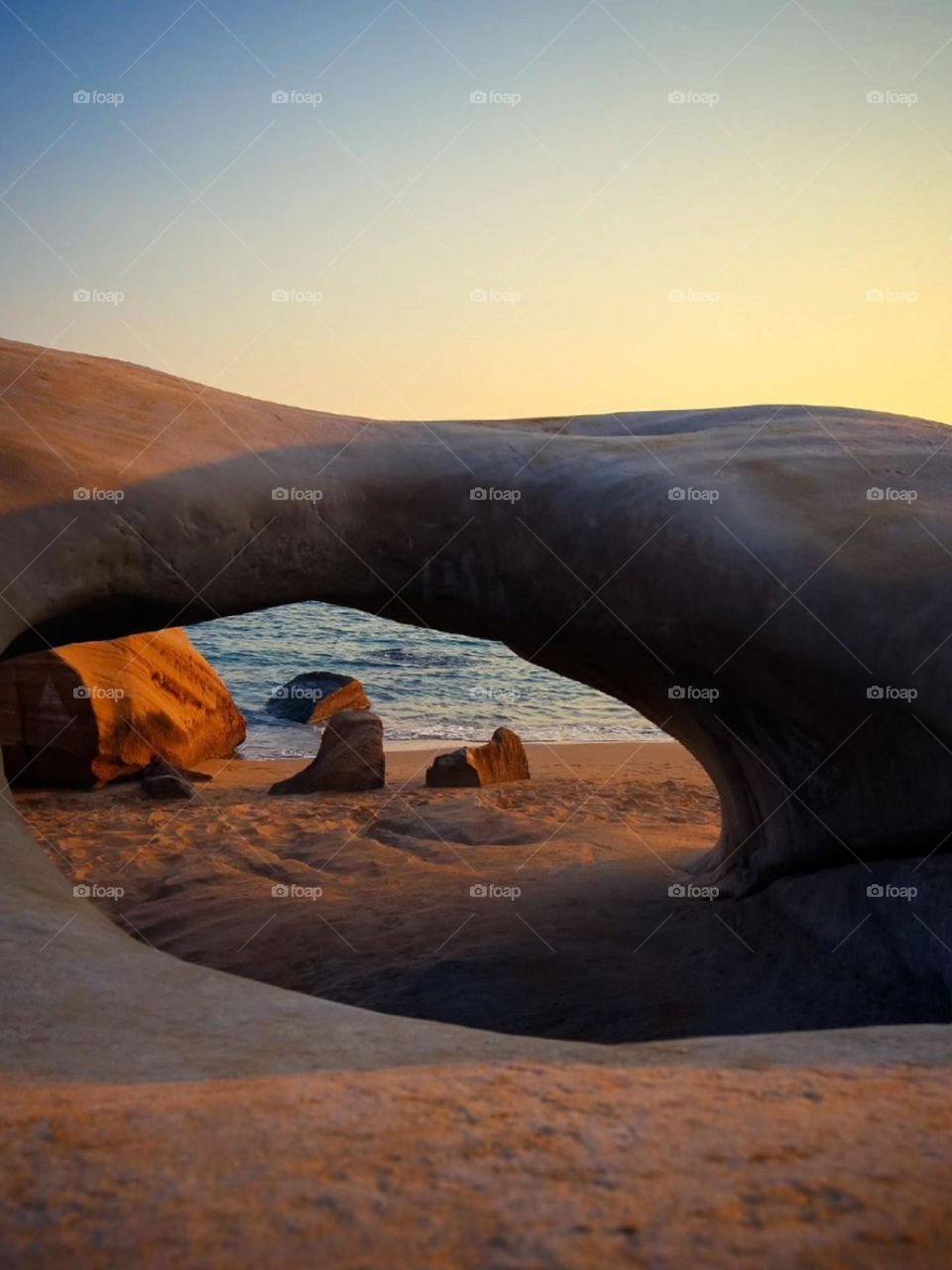 One of my best travels was to this beautiful rocky beach. Here there are rocks with geometric shapes and many holes, which are very attractive. I loved lying on these rocks. In addition to beauty, peace and silence are unforgettable