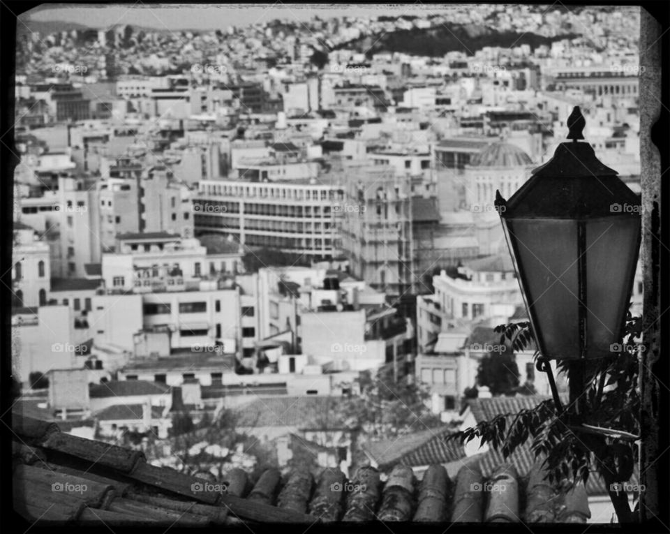 Street lamp, view on the city center of Athens 