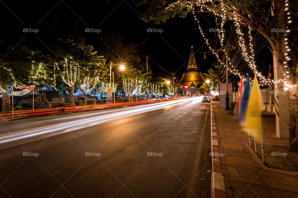 Road to pagoda in Thailand at night