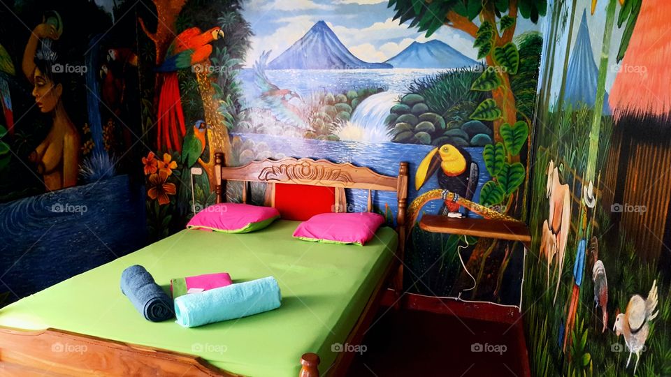 hotel room in Nicaragua with beautiful tropical mural