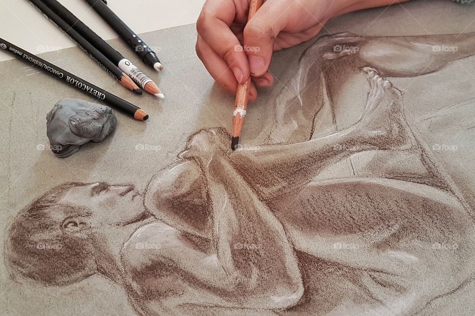 practicing classical drawing using charcoal