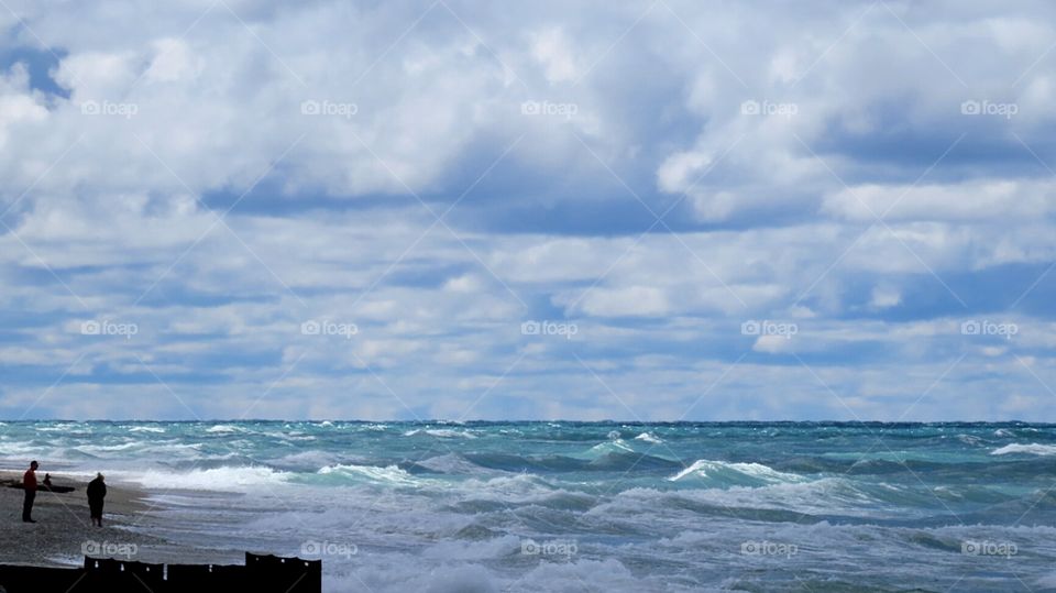 Day on windy waters on beach