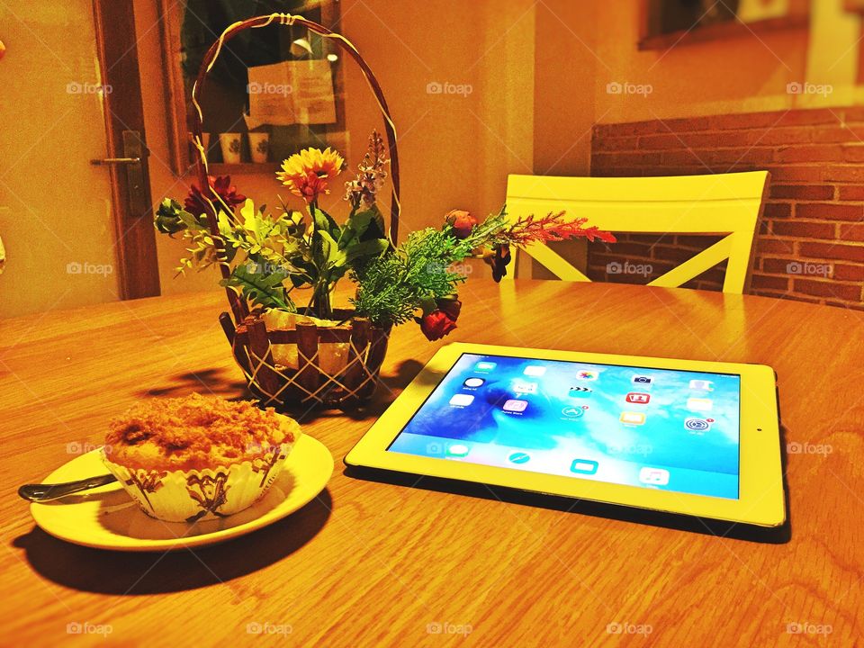 Egg cake and ipad on the table