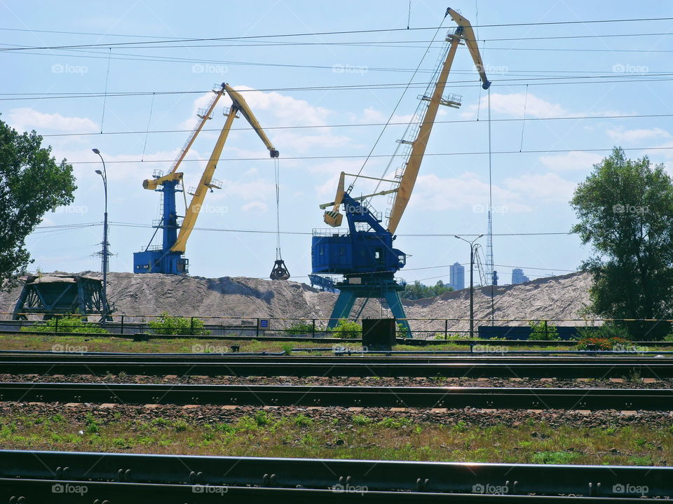 cranes operating near the railway