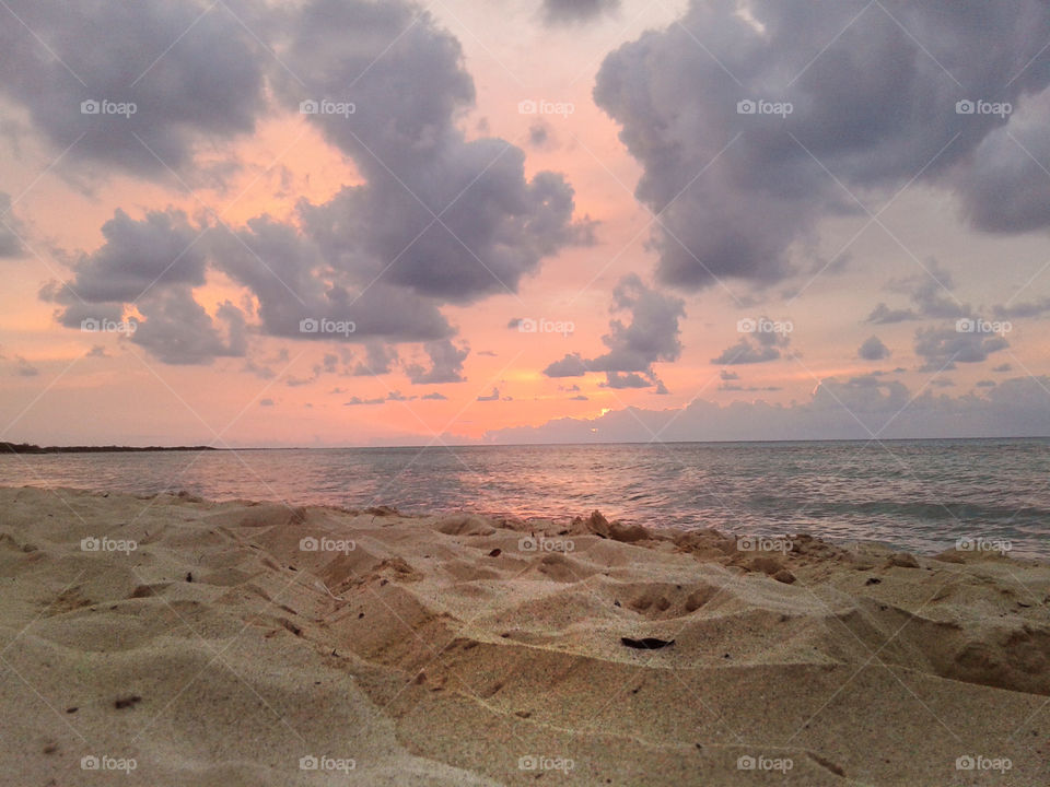 Cloudy sky over calm sea