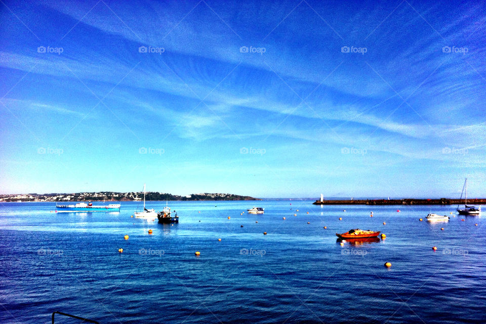 boats blue sky calm sea by deedeane