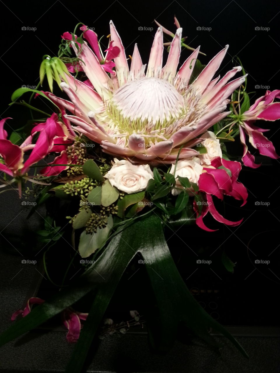 Wedding flowers: Protea and Gloriosa